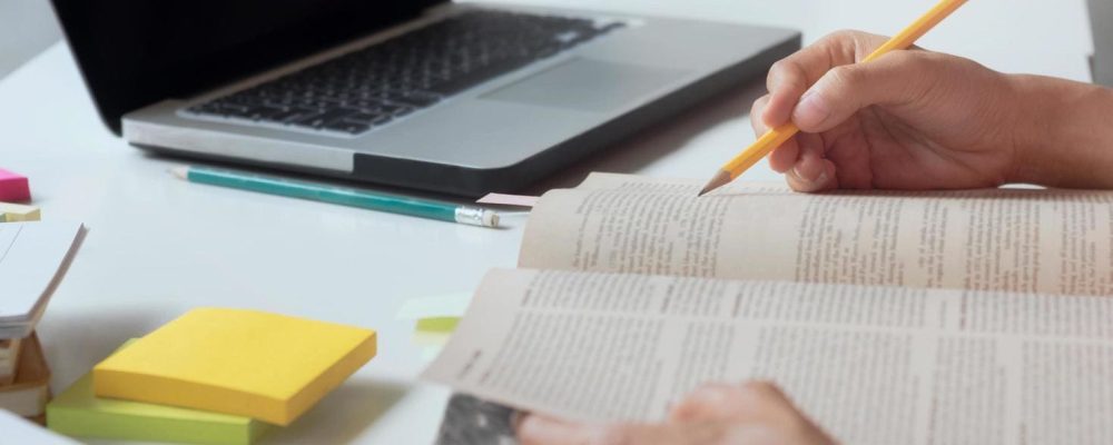 close-up-of-a-person-studying-free-photo (1)